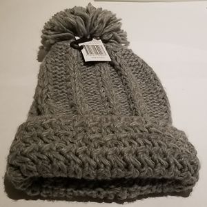 Knitted hat with pompom